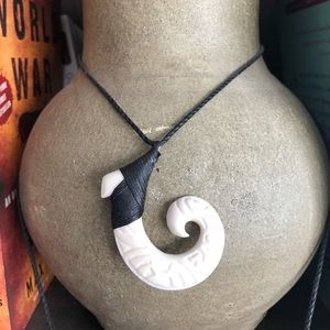 Hand carved fish hook necklace
